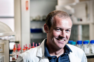 QUT researcher Dr Anthony O'Mullane has been presented witth the 2014 RACI award for his contribution to chemistry and its profession