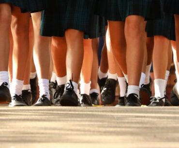 Group of kids in school uniform walking together