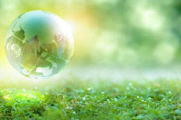 abstract planet earth with green background